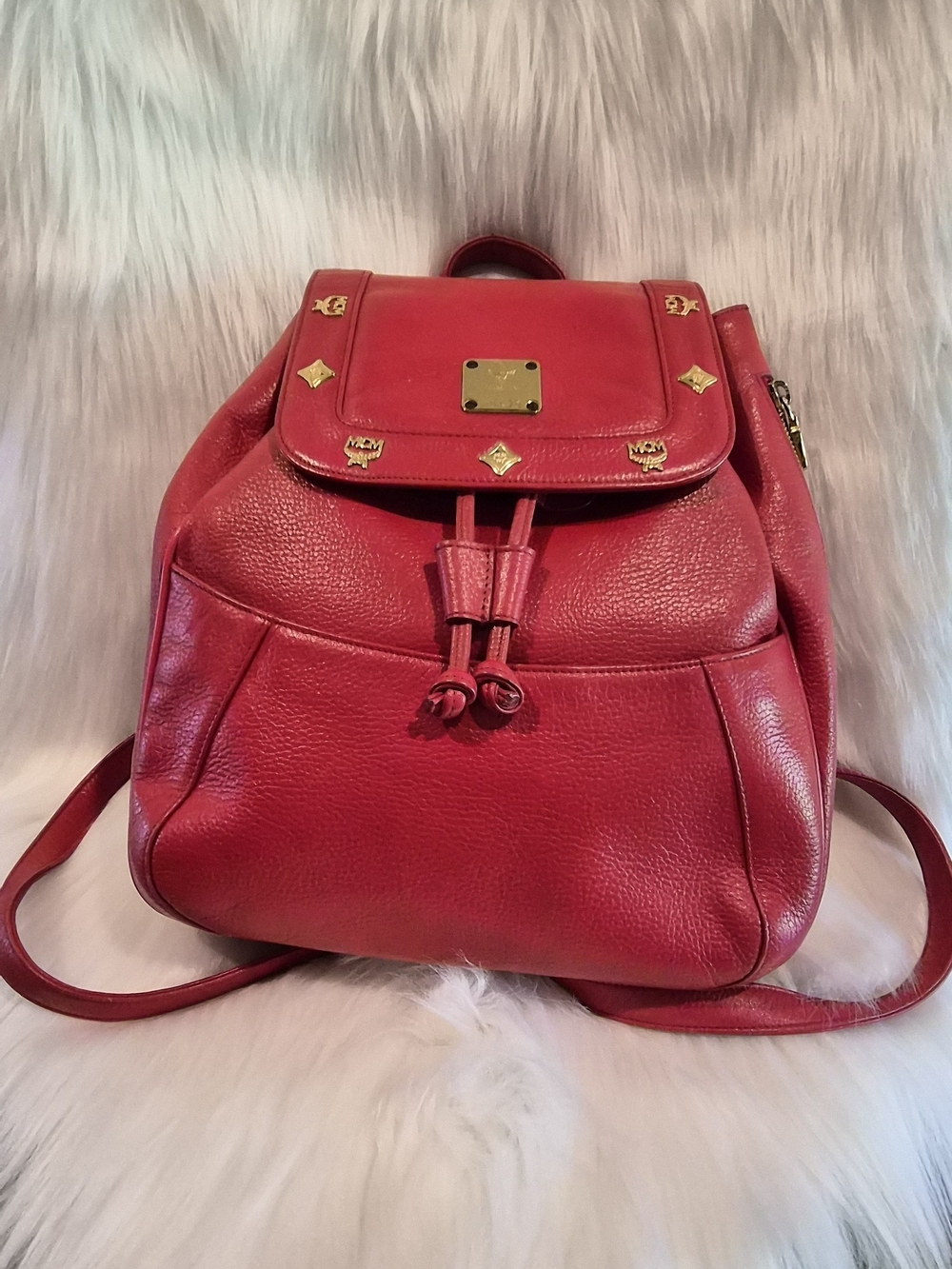 MCM Red Leather Drawstring Backpack with Gold Hardware